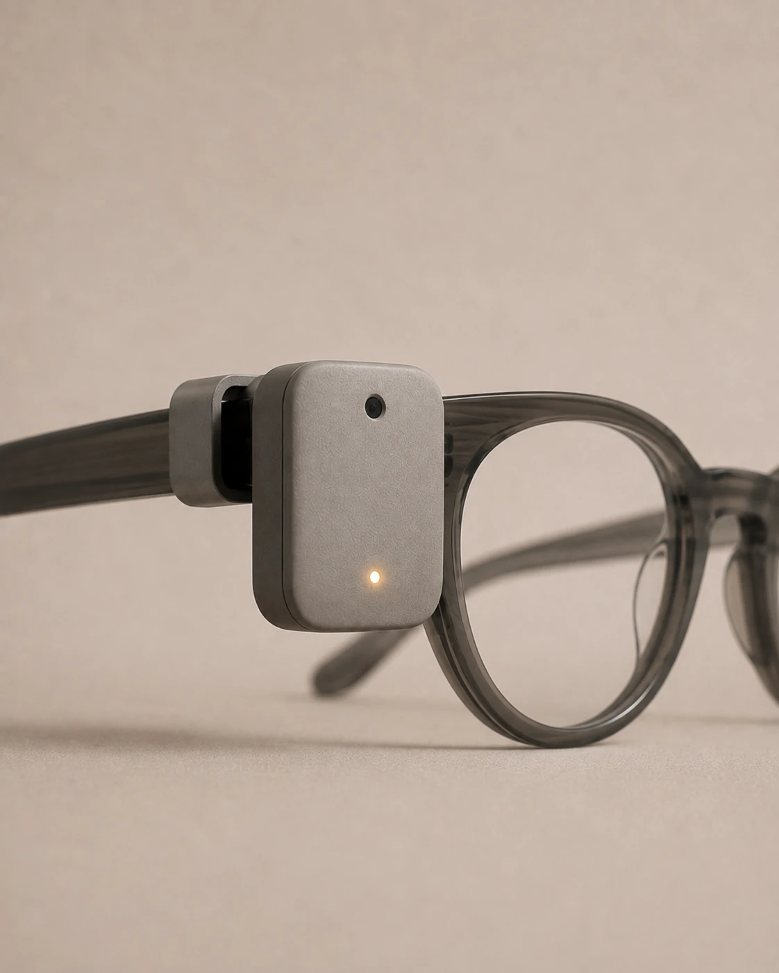 The Syntropic Labs Clip, a small memory-camera clip that attaches to your own glasses.